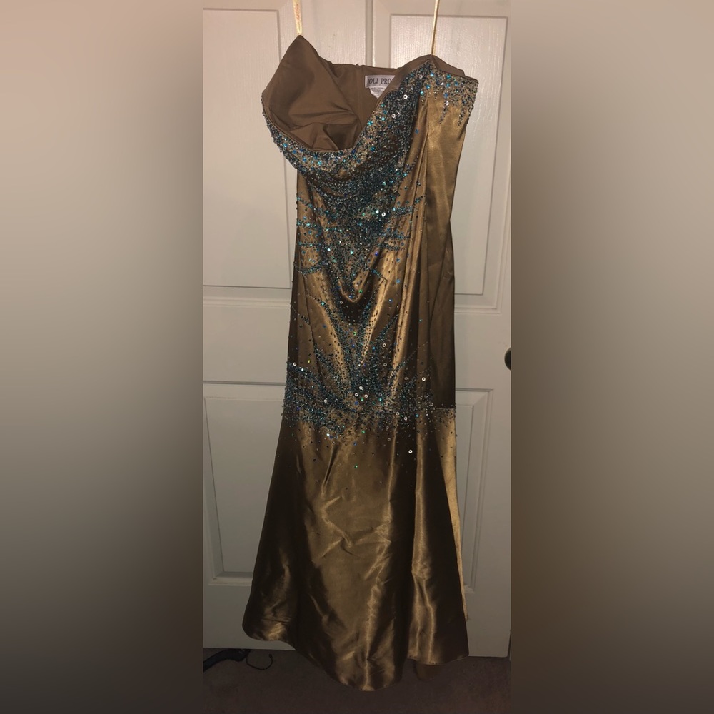 Luxe caramel mermaid style dress with blue sequin detail and beading